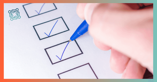 Person checking off boxes on a check list.